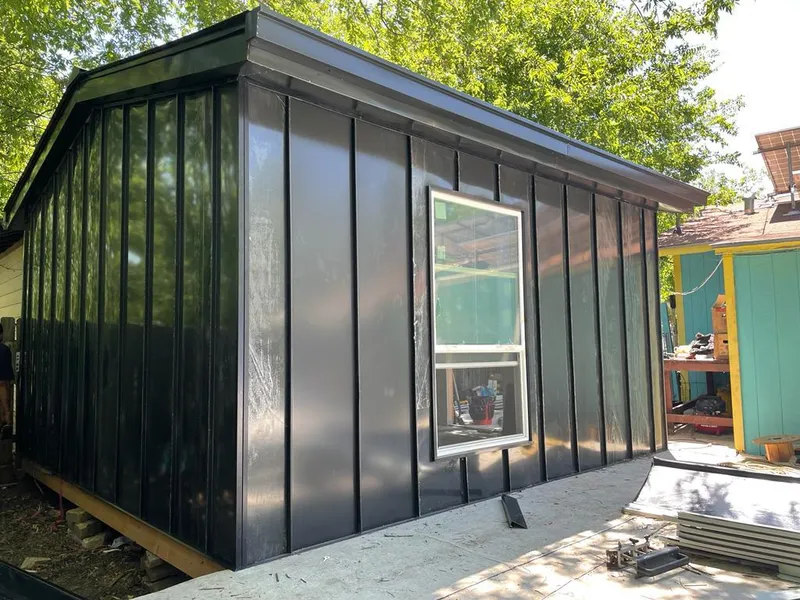 Black standing seam metal wall panels for Metal Roof Installation in Monroeville